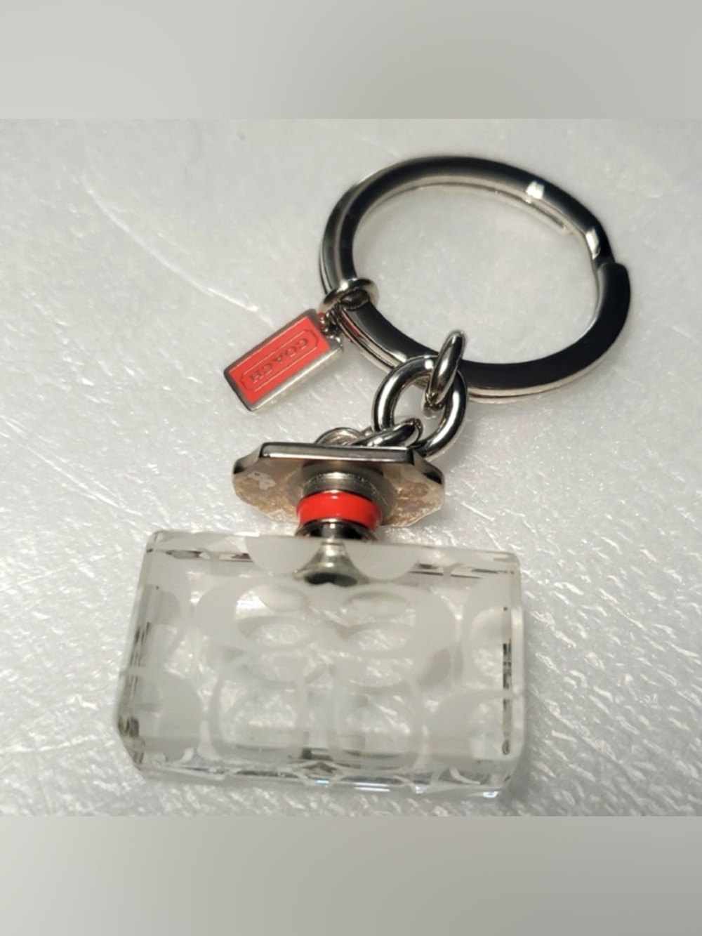 Coach Keychain. Clear and Red Accents.  (NO PERFUME) 🔑 ⛓️ NWOT! ❤️